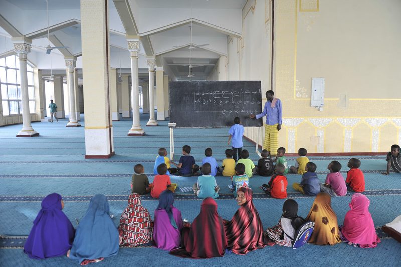 Children learning together in a mosque
